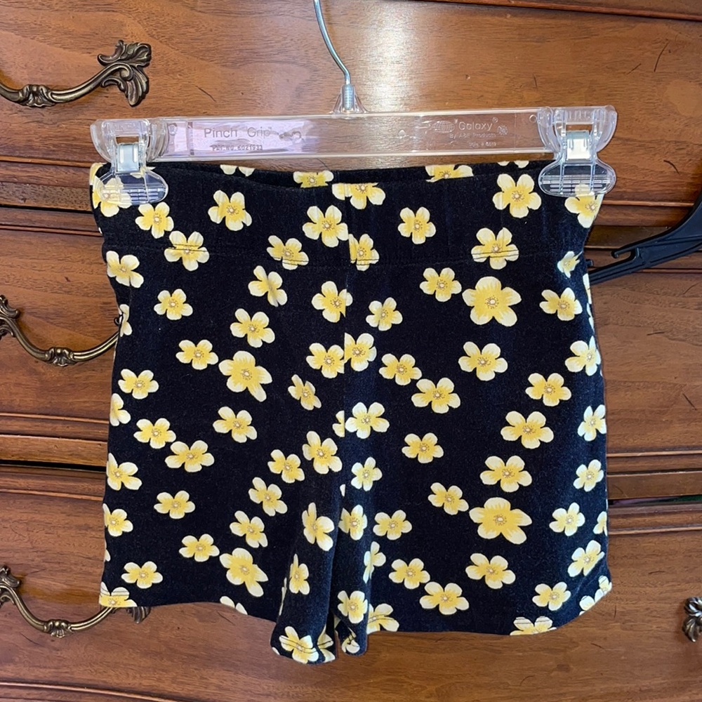 Black spandex spandex with yellow flowers